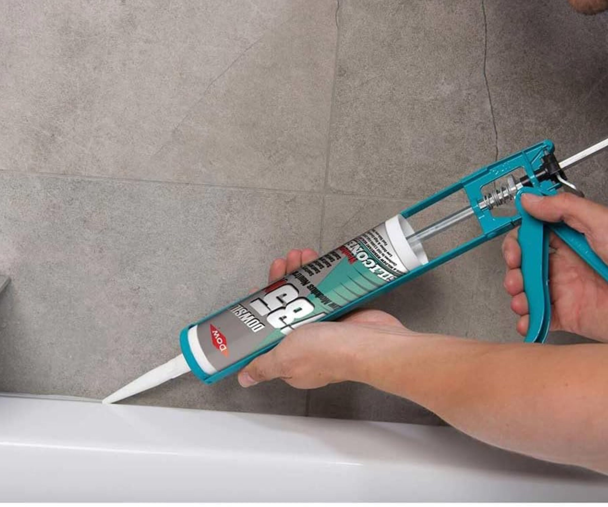 Dowsil 785N Silicone Sealant being applied next to bath tub