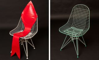 Two wire chairs, one decorated with a large red material