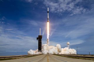 A SpaceX Falcon 9 rocket launches from NASA's Kennedy Space Center for an uncrewed in-flight abort test of a Crew Dragon spacecraft in January 2020. SpaceX's first crewed launch is set for May 27.