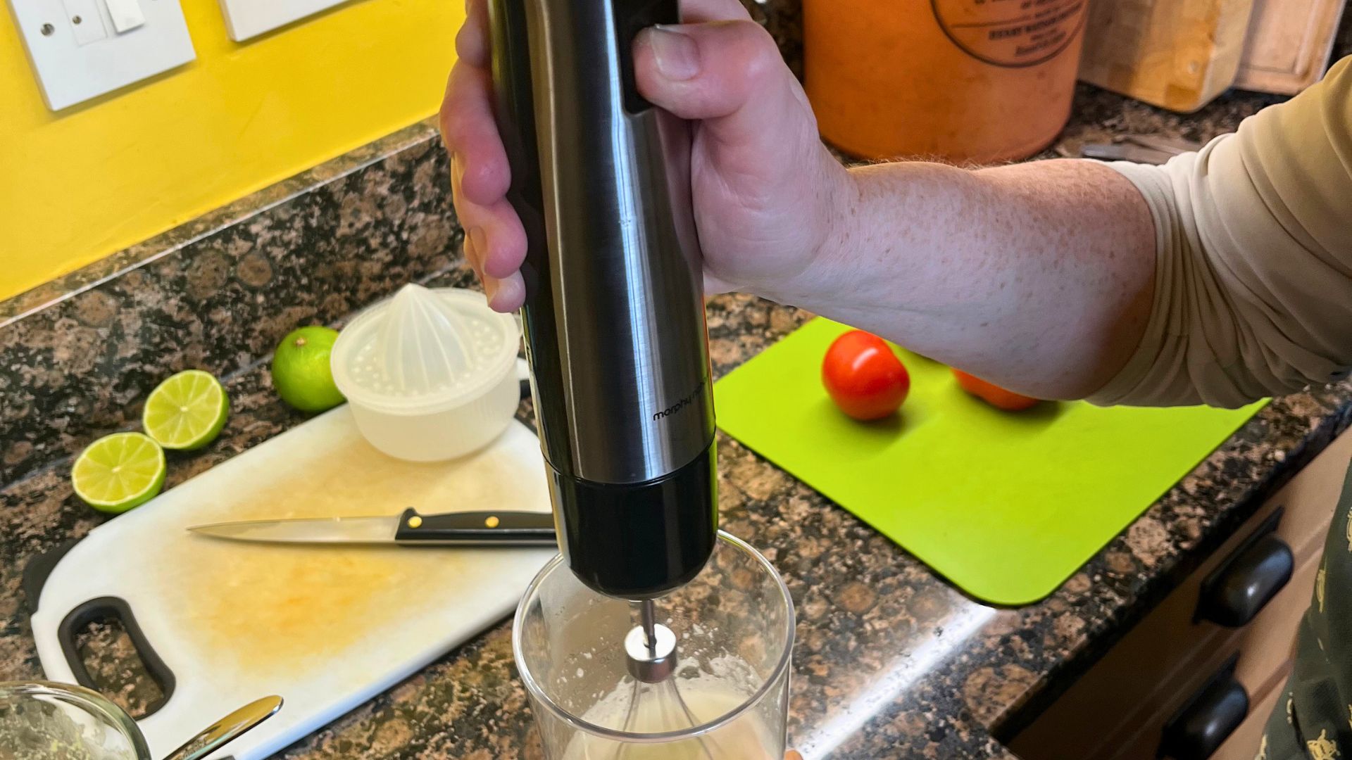 The Morphy Richards Handblender with Masher pictured in use by tester Josephine Kennedy while cooking in her ktichen at home