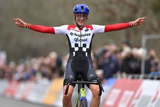 KOKSIJDE, BELGIUM - DECEMBER 21: Lucinda Brand of Netherlands and Team Baloise Glowi Lions celebrates at finish line as race winner during the 19th UCI Cyclo-Cross World Cup Koksijde 2025 - Women's Elite on December 21, 2025 in Koksijde, Belgium. (Photo by Luc Claessen/Getty Images)