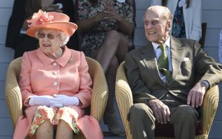 Queen Elizabeth II and Prince Philip, Duke of Edinburgh attend The OUT-SOURCING Inc Royal Windsor Cup 2018 polo match at Guards Polo Club