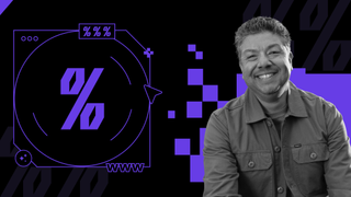 man smiling next to percentage sign