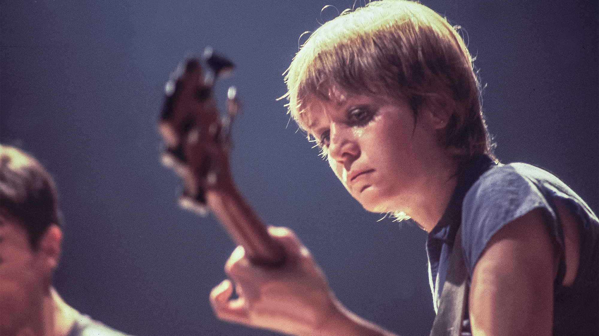 American New Wave musician Tina Weymouth, of the group Talking Heads, plays bass as she performs onstage at the Park West, Chicago, Illinois, August 23, 1978.