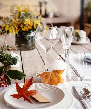 Thanksgiving table decor with fall leaf