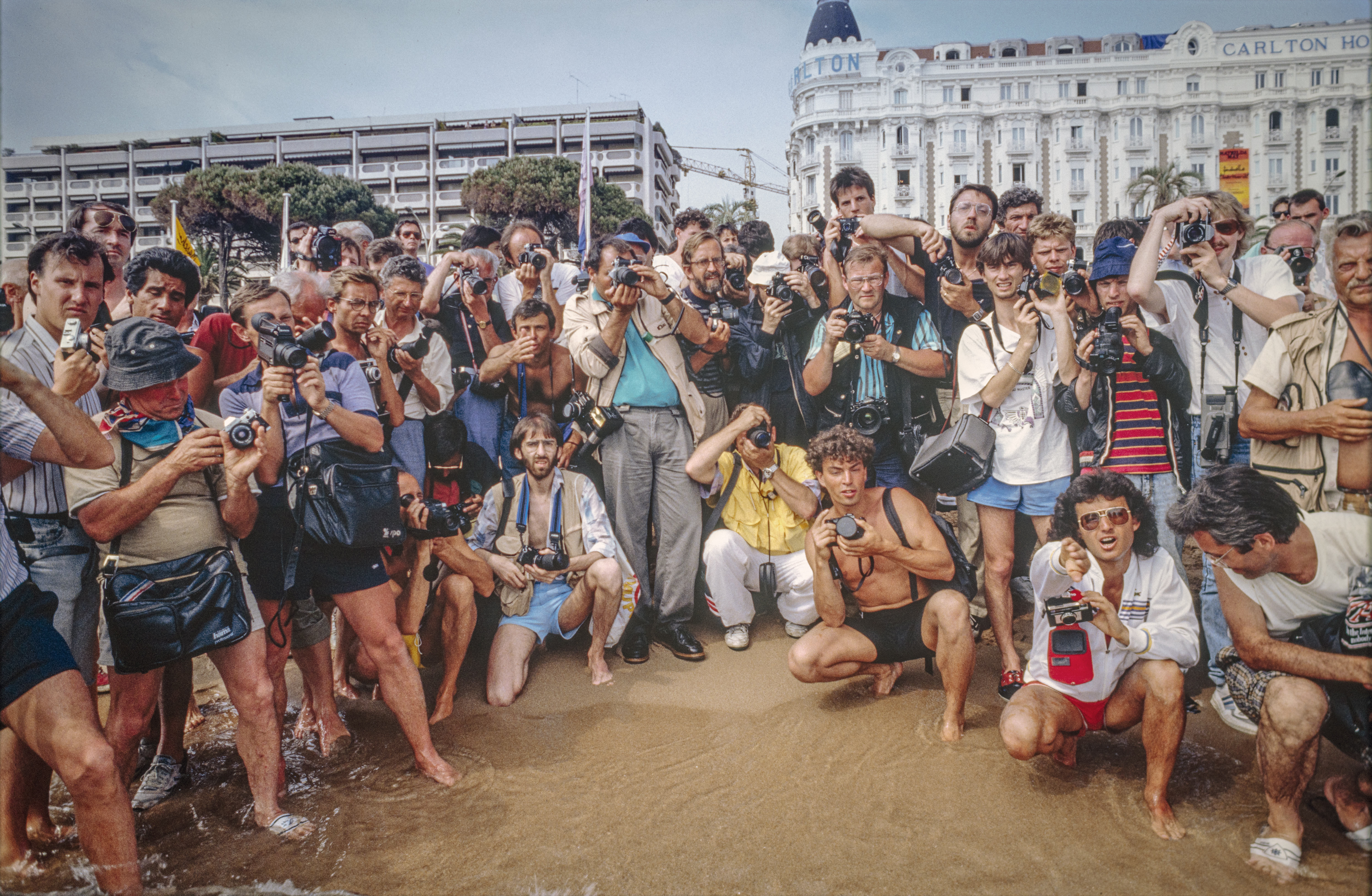 crowd of photographers on beach