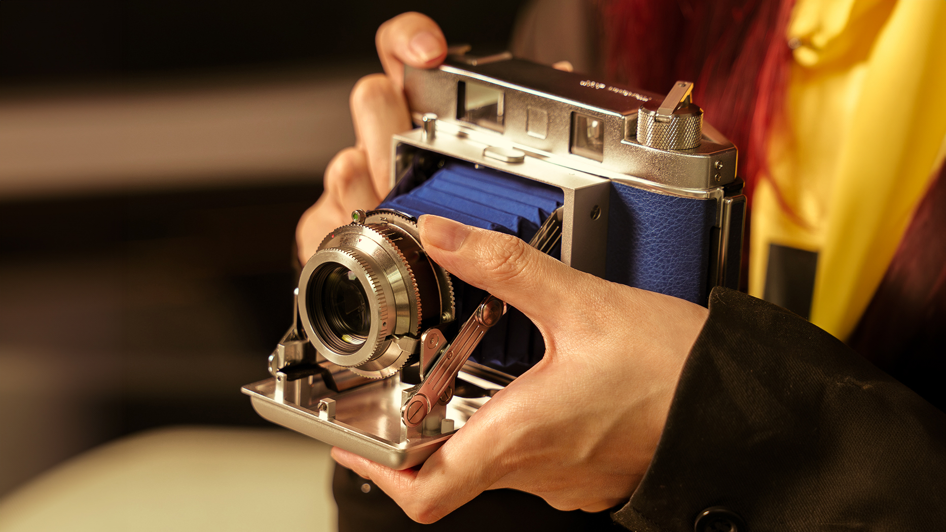 Promotional images of the "beta" TTArtisan 203-T Folding camera