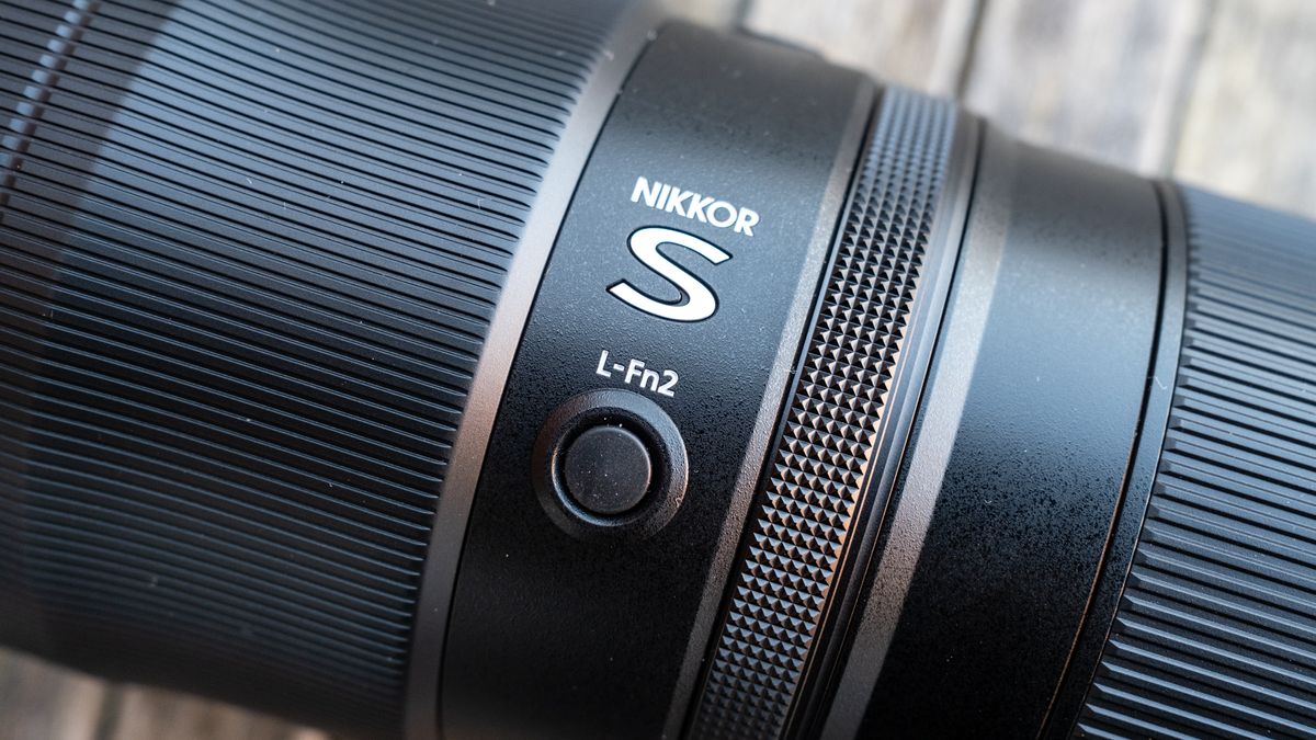 Nikkor Z 600mm f/6.3 VR S attached to a Nikon Z 7II on a frosty wooden table
