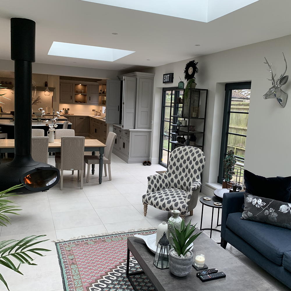 attached living room with dining area and kitchen