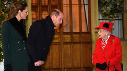 Queen Elizabeth II talks with the Duke and Duchess of Cambridge in the quadrangle at Windsor Castle to meet and thank members of the Salvation Army and local volunteers and key workers from organisations and charities in Berkshire, for the work they are doing to help others during the pandemic and over Christmas.