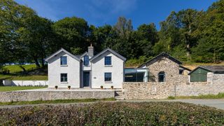 glass and stone extension to farm cottage