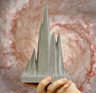 A 3D-printed depiction of one of FRB 121102's radio bursts detected with Arecibo shows how bright the burst was as a function of observed radio frequency and time.