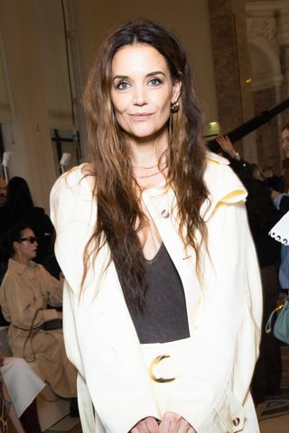 Katie Holmes in beachy waves and a white suit