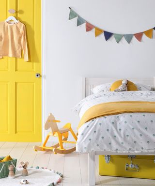 Kids bedroom with yellow door by Furniture and Choice