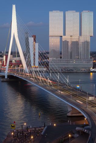 Overlooking a bridge which leads to the multi-building high rise De Rotterdam complex.