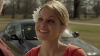 Candace Cameron Bure with a flower in her hair in Finding Normal 2013. 