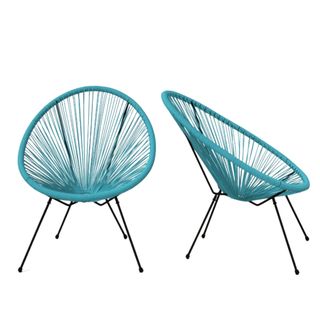 Two blue wicker chairs