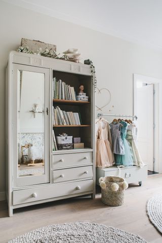 kids' closet ideas with open shelving in a white kid's bedroom