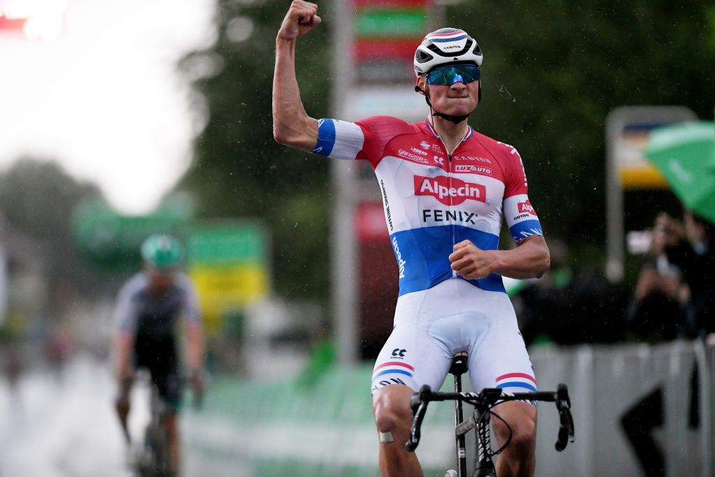 LACHEN SWITZERLAND JUNE 07 Mathieu Van Der Poel of Netherlands and Team AlpecinFenix stage winner celebrates at arrival during the 84th Tour de Suisse 2021 Stage 2 a 178km stage from Neuhausen am Rheinfall to Lachen Rain UCIworldtour tds tourdesuisse on June 07 2021 in Lachen Switzerland Photo by Tim de WaeleGetty Images