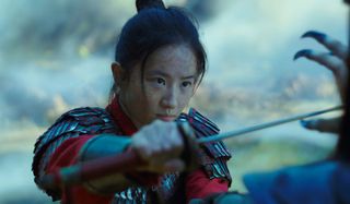 Mulan raises her sword against an enemy