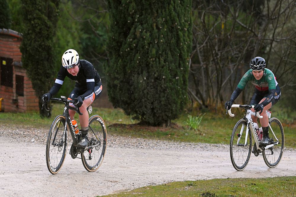 Anna van der Breggen attacks a gravel climb at Strade Bianche