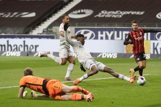Leverkusen defender Edmond Tapsoba scores an own goal