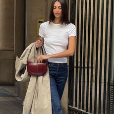 Woman in white t-shirt and jeans