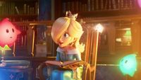 Princess Rosalina is reading to stars from a storybook in the Super Mario Galaxy trailer.