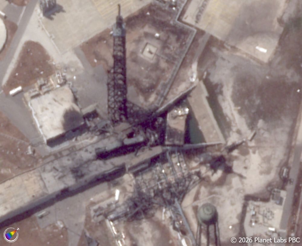 Satellite view of the aftermath of a rocket explosion on a lanchpad.