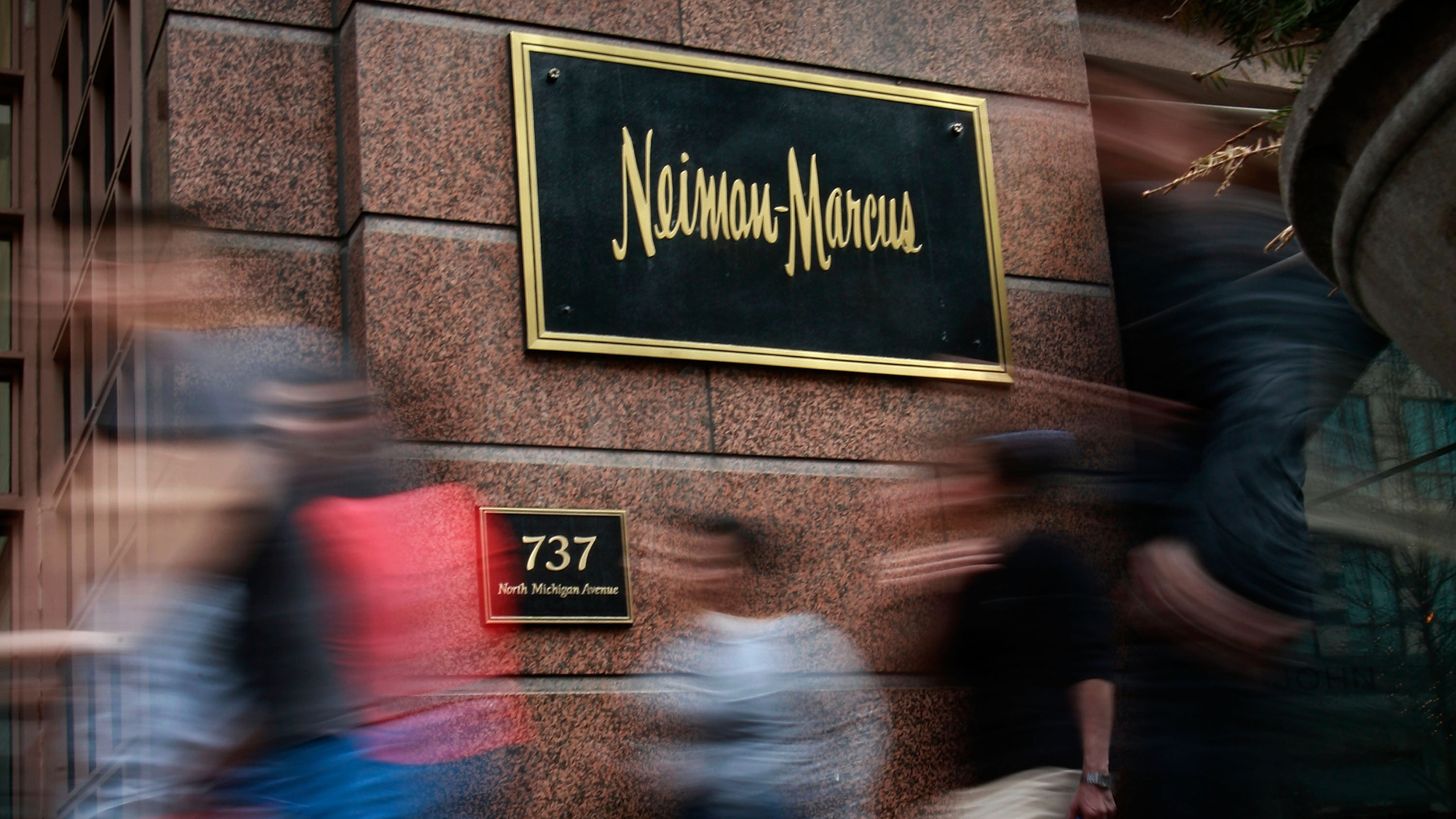 Saks buys Neiman Marcus in $2.65B deal 