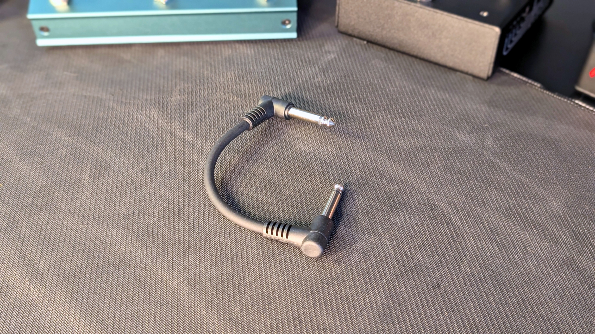A Donner Patch Cable on a desk