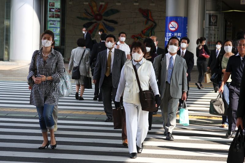 people wearing masks.