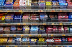 Food price inflation as shown by shelves stocked full of chocolate (photo by Mike Kemp/In Pictures via Getty Images)