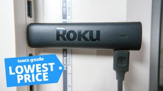Roku Streaming Stick 4K plugged into the back of a TV