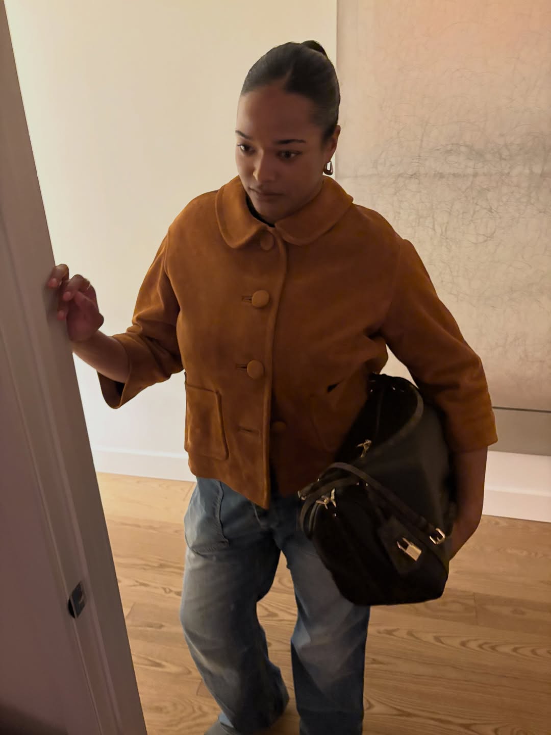 Imani Randolph in a Peter Pan collared jacket.