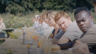 Christian's different colored drink in Midsommar.
