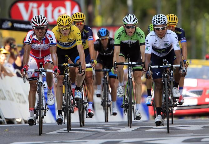 The maillot jaune group hits the line 11 minutes down on stage winner Rui Costa