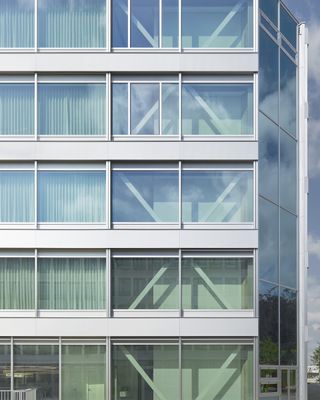 detail of masterful glass facade of Roche office by Christ & Gantenbein