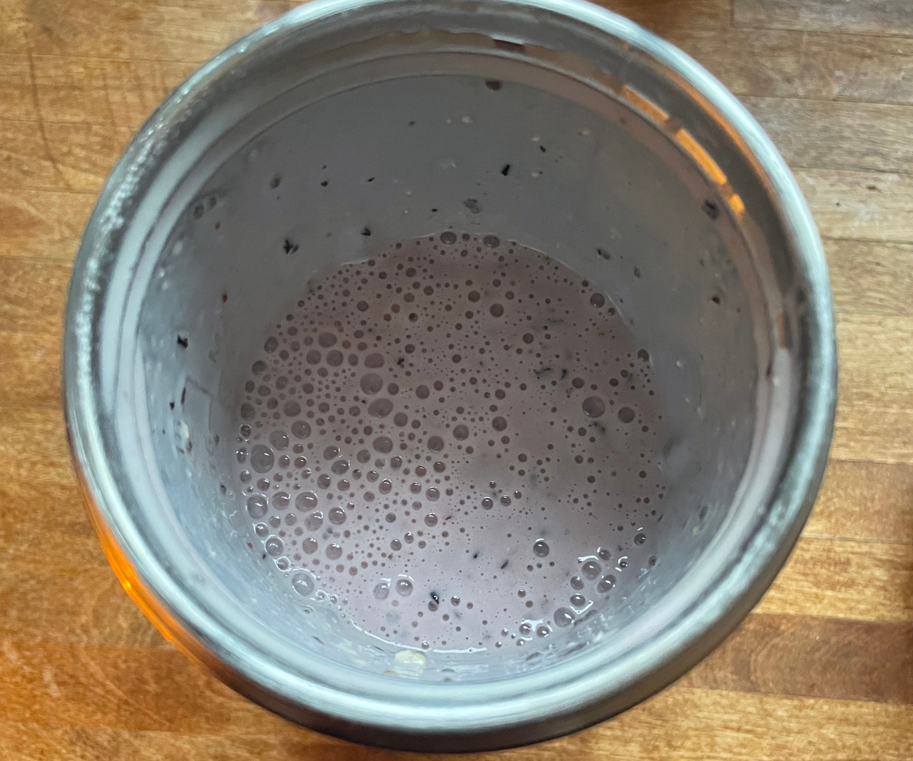 A blueberry breakfast smoothie in the nutribullet Flip&trade; Insulated Portable Blender