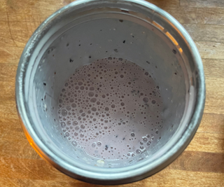 A blueberry breakfast smoothie in the nutribullet Flip™ Insulated Portable Blender