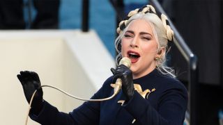 US Singer Lady Gaga sings the US National Anthem during the 59th Presidential Inaguruation on January 20, 2021, at the US Capitol in Washington, DC. (Photo by SAUL LOEB / POOL / AFP) (Photo by SAUL LOEB/POOL/AFP via Getty Images)