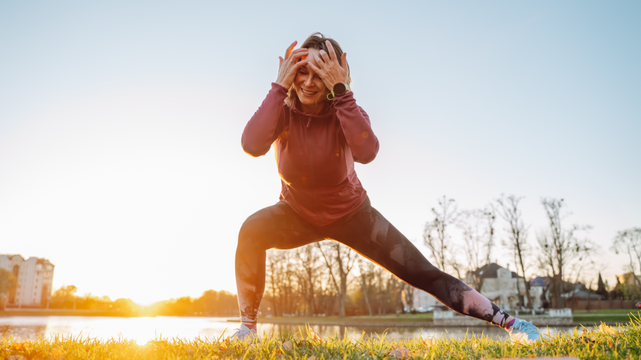 Woman outside doing lateral lunges