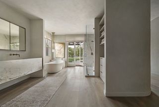 A bathroom designed in gray limewash walls