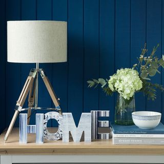 table lamp with white flower vase and white bowl