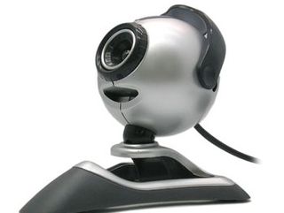 Webcam for an eye, this week; bluetooth headset for an ear next week