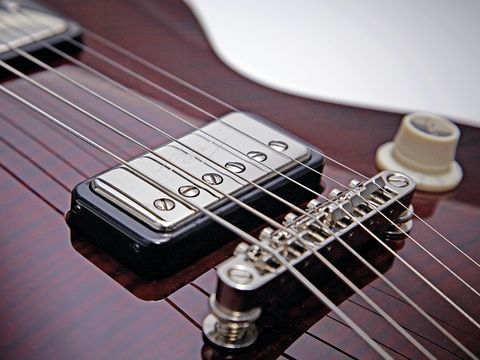 The Solid's tune-o-matic-style bridge is married to a trapeze tailpiece.
