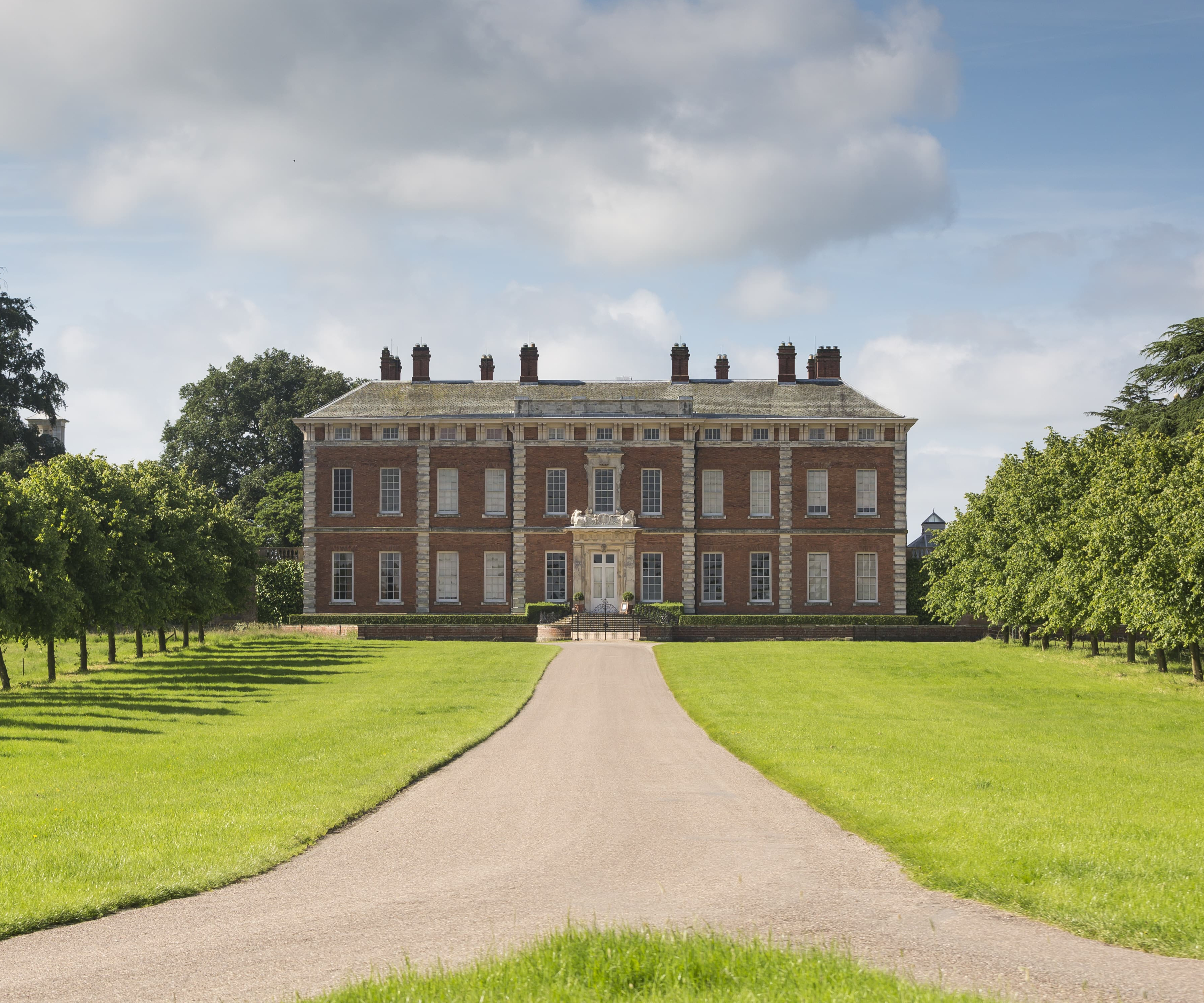 View up the long, straight driveway of Beningbrough Hall, a National Trust stately home
