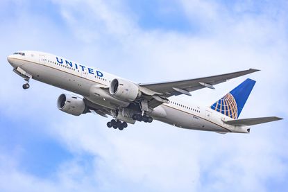 A Boeing 777-200 with United Airlines livery. 