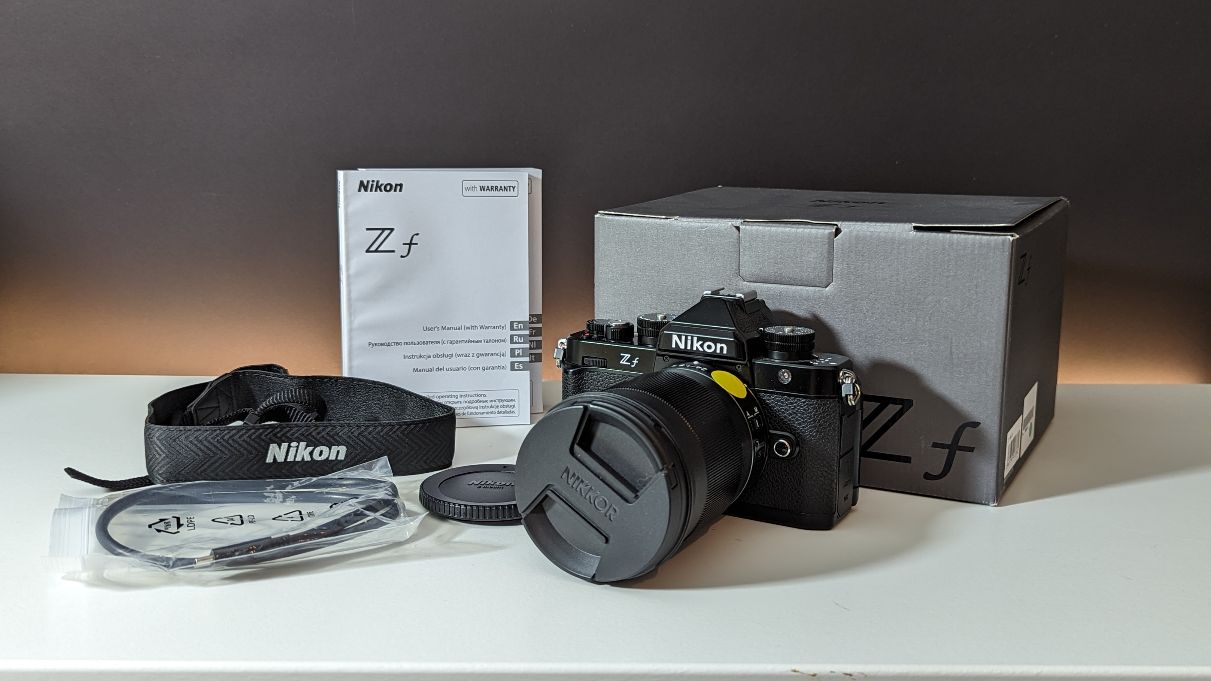 Nikon Zf and box and content on white table