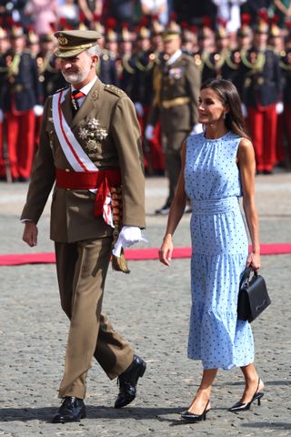 Queen Letizia and King Felipe watched their 17 year old daughter take part in the historic ceremony